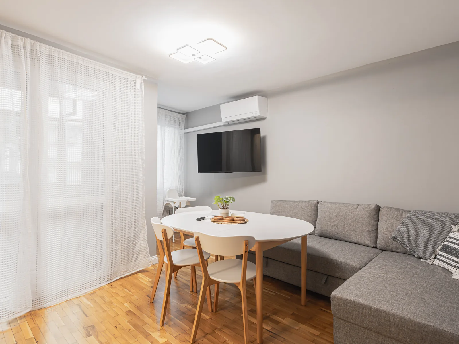 Living room with sofa and dining table