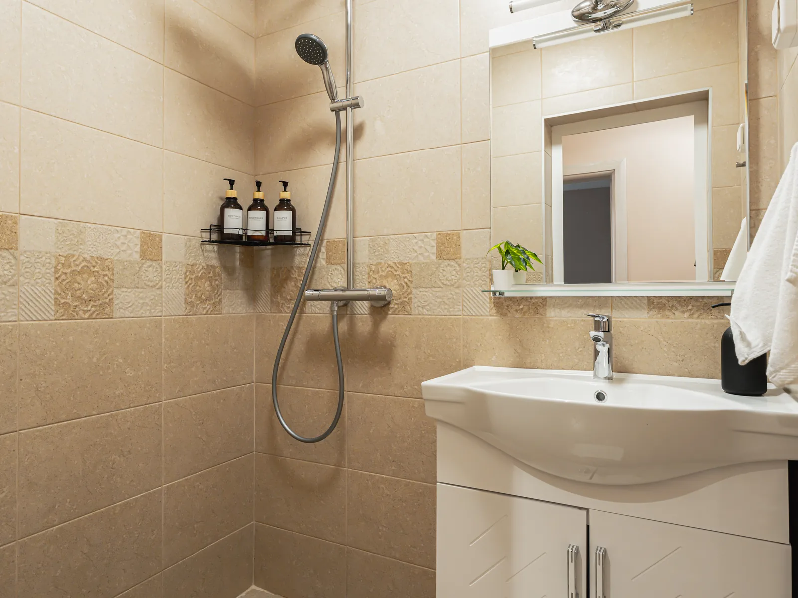 Bathroom with shower and sink